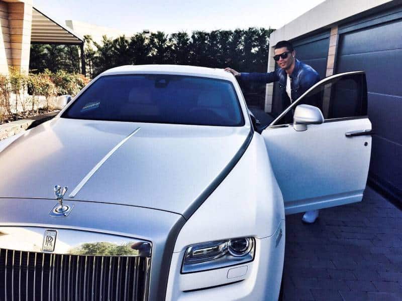 Cristiano Ronaldo with his Rolls Royce Phantom