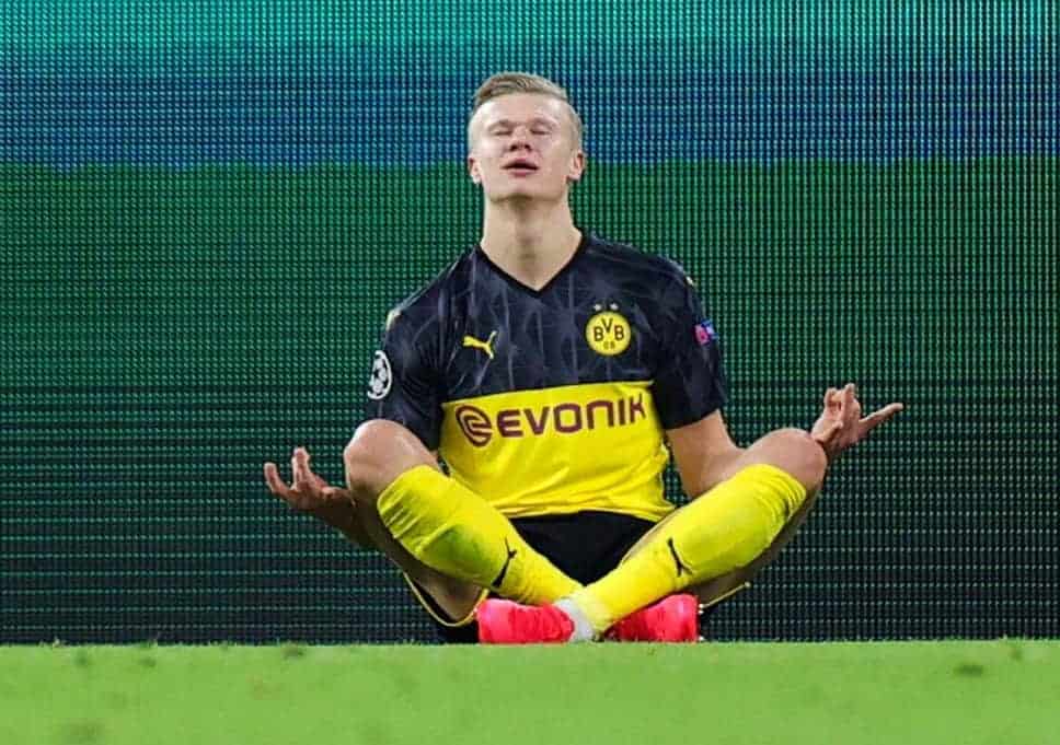 Borussia Dortmund star Erling Haaland meditating after scoring a goal