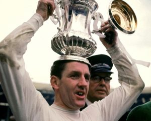Dave Mackay holding the PL trophy