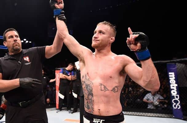 Justin Gaethje celebrates after defeating Michael Johnson in their lightweight bout during The Ultimate Fighter Finale at T-Mobile Arena on July 7, 2017 