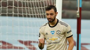 Bruno Fernandes celebrates after taking a penalty and scores his team's first goal during the English Premier League football match between Aston Villa and Manchester United at Villa Park in Birmingham,