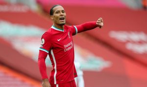 Liverpool's Virgil van Dijk gestures during the Premier League match between Liverpool and Leeds United at Anfield on September 12, 2020 in Liverpool, United Kingdom.