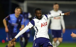 Tanguy Ndombele of Tottenham Hotspur looks to break past Josh Knight of Wycombe Wanderers during The Emirates FA Cup Fourth Round match between Wycombe Wanderers and Tottenham Hotspur at Adams Park on January 25, 2021 in High Wycombe, England. Sporting stadiums around the UK remain under strict restrictions due to the Coronavirus Pandemic as Government social distancing laws prohibit fans inside venues resulting in games being played behind closed doors. (Photo by Tottenham Hotspur FC/Tottenham Hotspur FC via Getty Images)