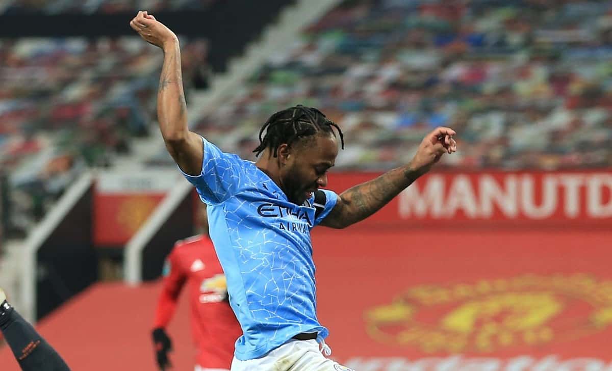 MANCHESTER, ENGLAND - JANUARY 06: Man Utd goalkeeper Dean Henderson saves at the feet of Raheem Sterling of Manchester City during the Carabao Cup Semi Final match between Manchester United and Manchester City at Old Trafford on January 6, 2021 in Manchester, England. (Photo by Simon Stacpoole/Offside/Offside via Getty Images)