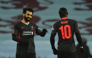 Sadio Mane of Liverpool with Mohamed Salah of Liverpool before the FA Cup Third Round match between Aston Villa and Liverpool on January 08, 2021 in Birmingham, England. The match will be played without fans, behind closed doors as a Covid-19 precaution. (Photo by Andrew Powell/Liverpool FC via Getty Images)