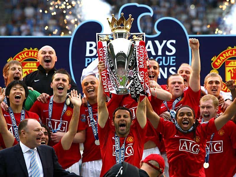 Manchester United celebrating Champions League trophy