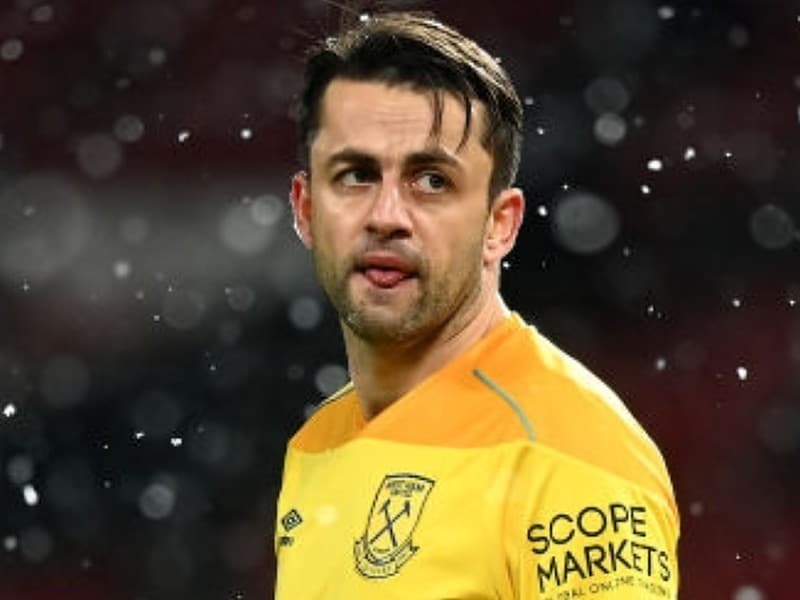 Lukasz Fabianski of West Ham looks on during The Emirates FA Cup Fifth Round match between Manchester United and West Ham United at Old Trafford on February 09, 2021 in Manchester, England. Sporting stadiums around the UK remain under strict restrictions due to the Coronavirus Pandemic as Government social distancing laws prohibit fans inside venues resulting in games being played behind closed doors. (Photo by Michael Regan/Getty Images)