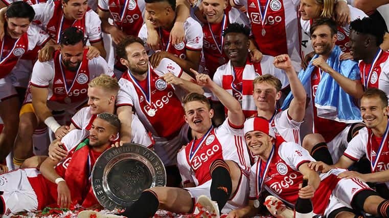 Ajax celebrating Eredivisie trophy