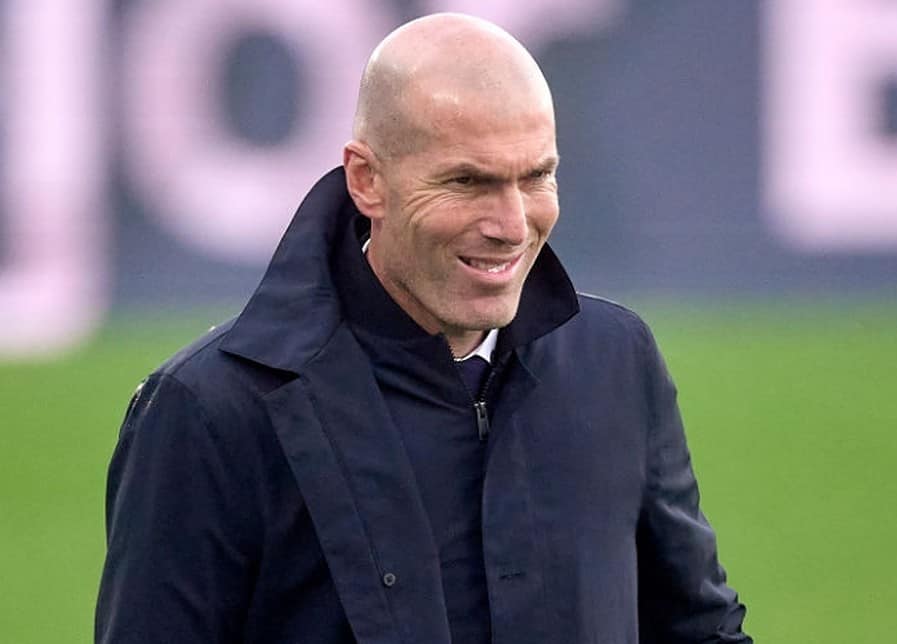 Zinedine Zidane head Coach of Real Madrid reacts during the La Liga Santander match between Real Madrid and SD Eibar at Estadio Alfredo Di Stefano on April 03, 2021 in Madrid, Spain. Sporting stadiums around Spain remain under strict restrictions due to the Coronavirus Pandemic as Government social distancing laws prohibit fans inside venues resulting in games being played behind closed doors. (Photo by Diego Souto/Quality Sport Images/Getty Images)