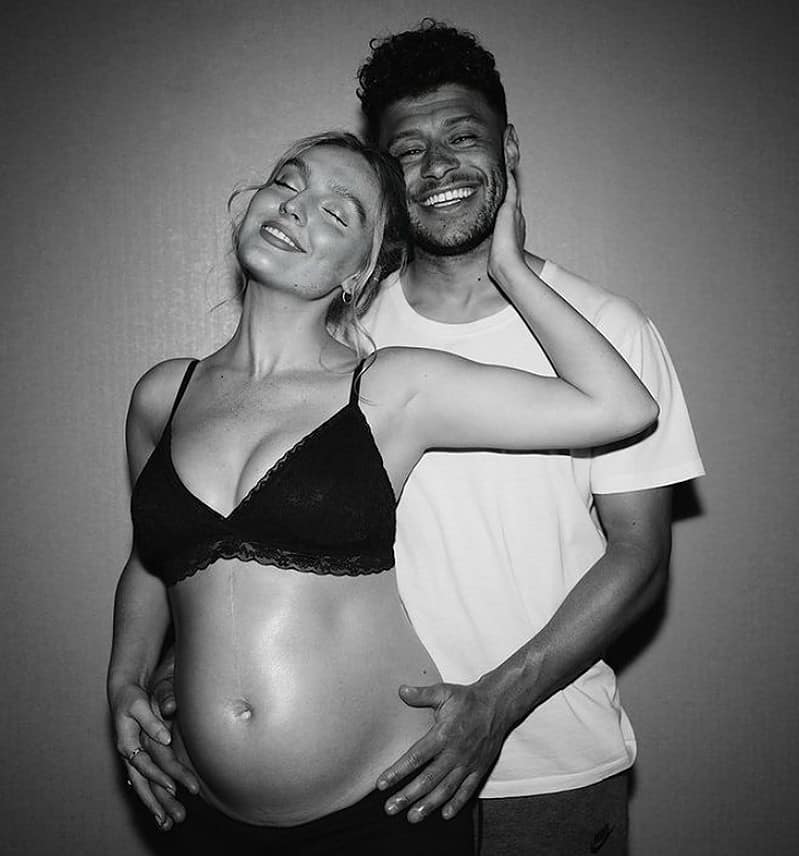 Alex Oxlade Chamberlain with his pregnant wife