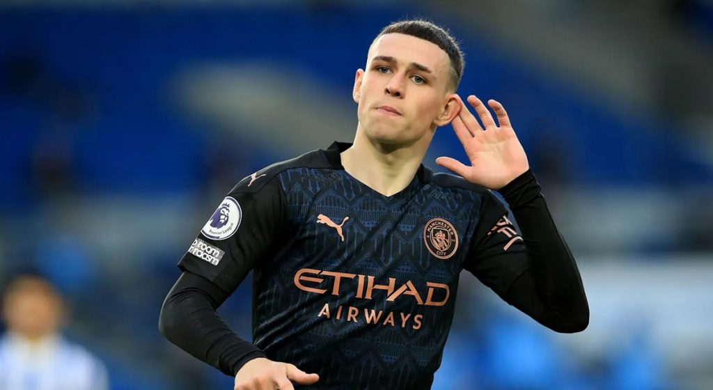 Phil Foden celebrates his eighth Premier League goal of the season, which has doubled the visitors' lead